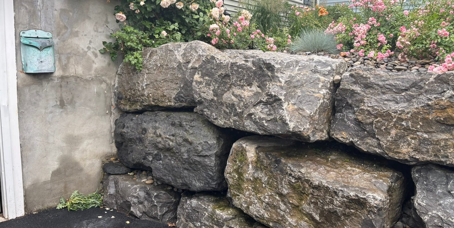 Gap between the retaining wall and foundation beneath the front stairs identified during the inspection as a potential source of water intrusion and future repair costs.