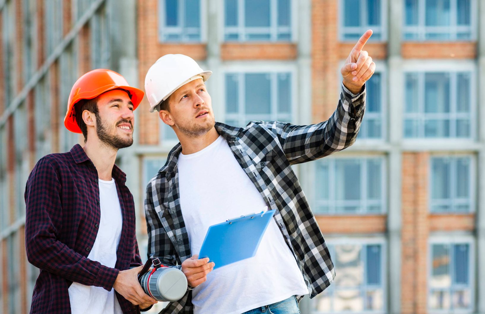 engineering team reviewing construction plans